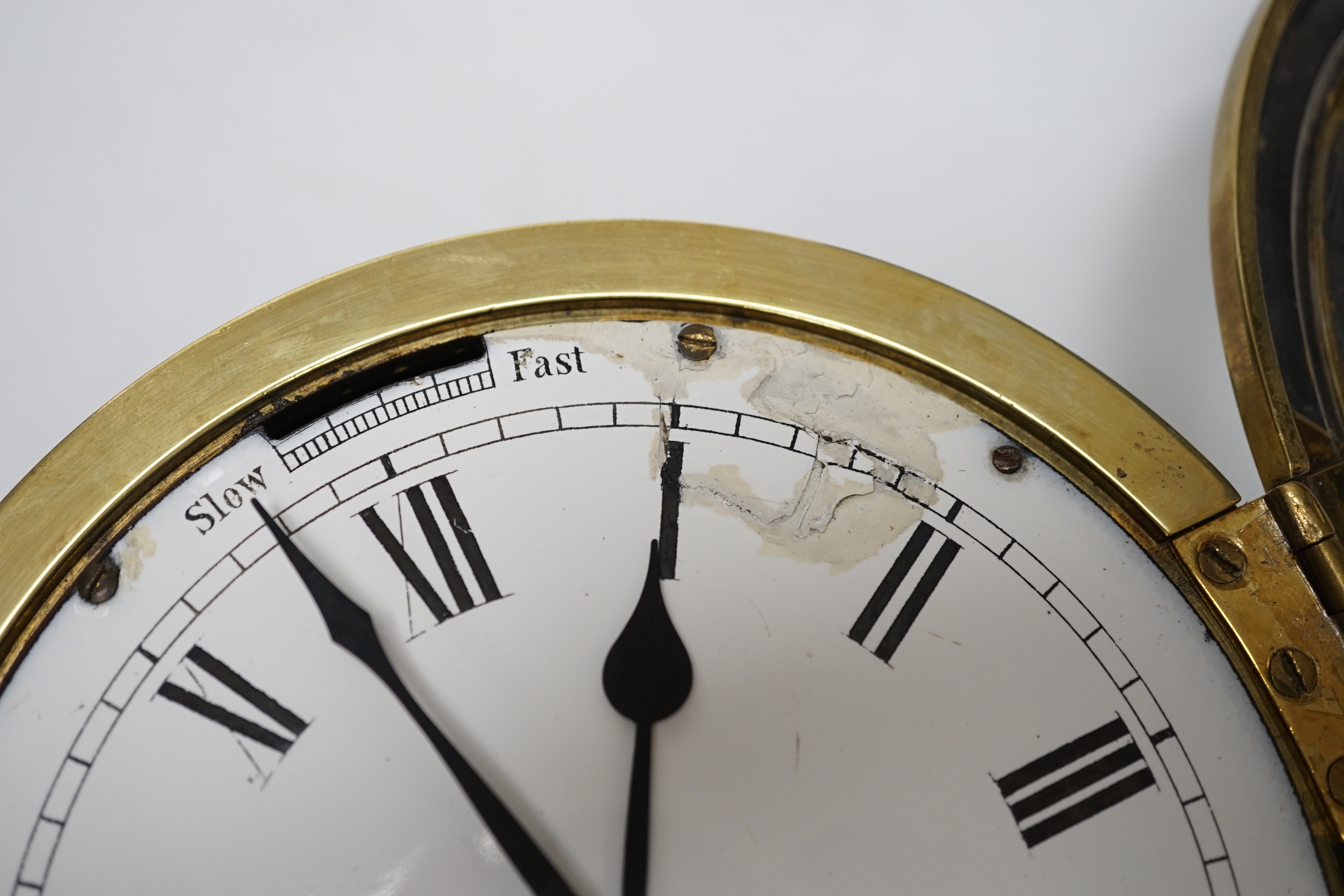 A brass ship’s bulkhead timepiece, 21cm diameter